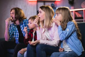 family watching a television show